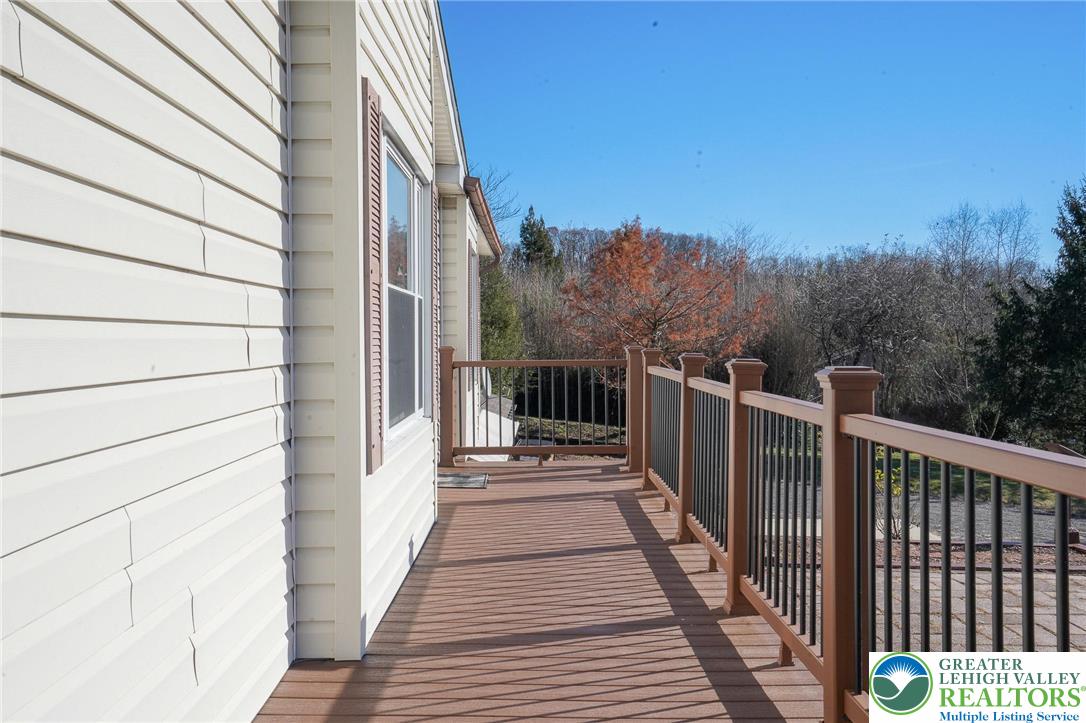 7221 Borman Road New Tripoli, PA 18066 - Photo 37 of 62 a view of a balcony with wooden floor and fence