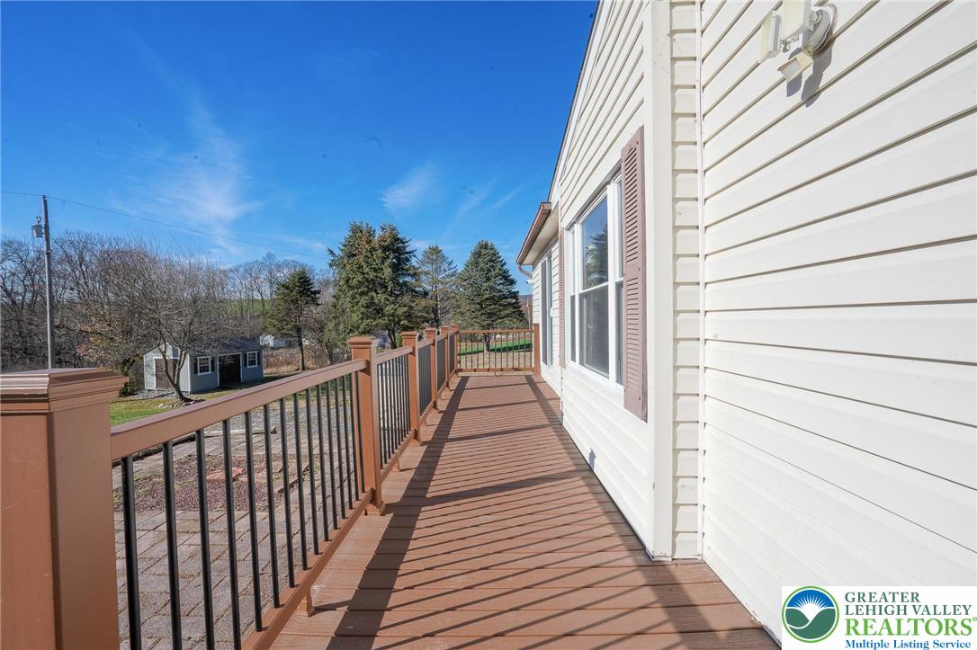 7221 Borman Road New Tripoli, PA 18066 - Photo 38 of 62 a view of a balcony with wooden fence and floor