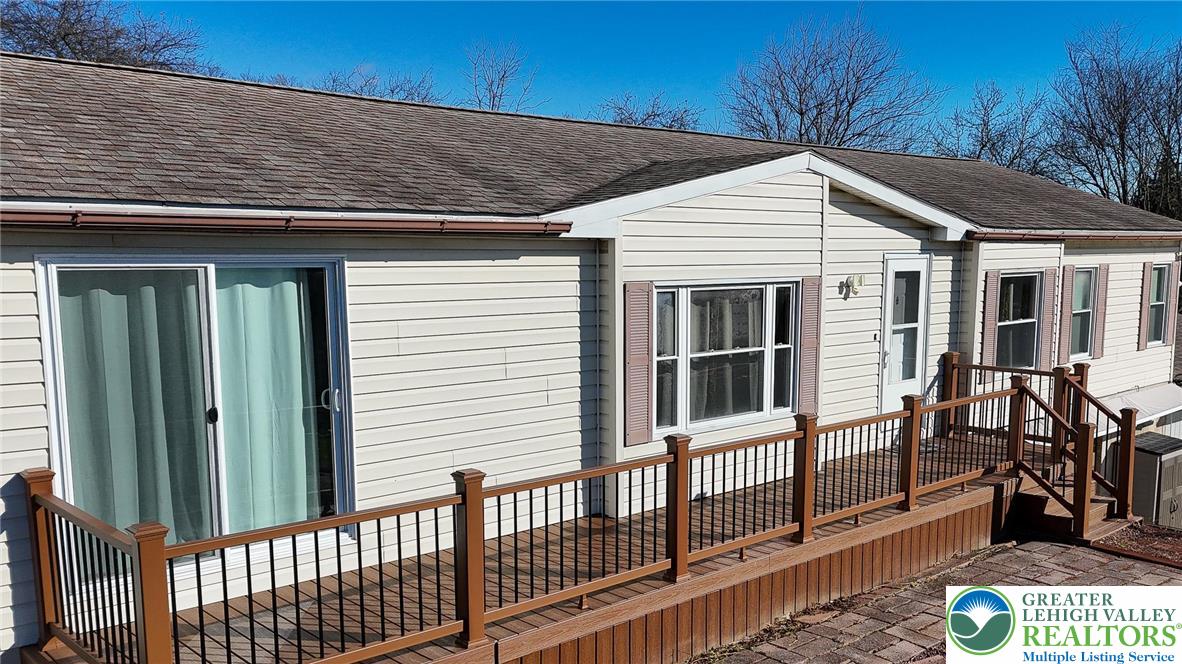 7221 Borman Road New Tripoli, PA 18066 - Photo 40 of 62 a view of a house with backyard and porch