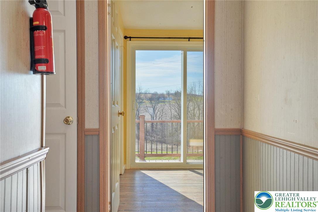 7221 Borman Road New Tripoli, PA 18066 - Photo 41 of 62 a view of front door with wooden floor