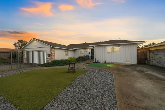 a view of outdoor space yard and front view of a house