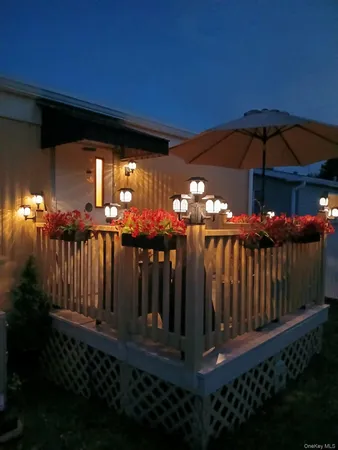 a view of outdoor space with deck and patio
