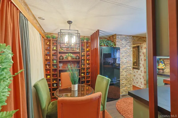 a view of a living room with furniture