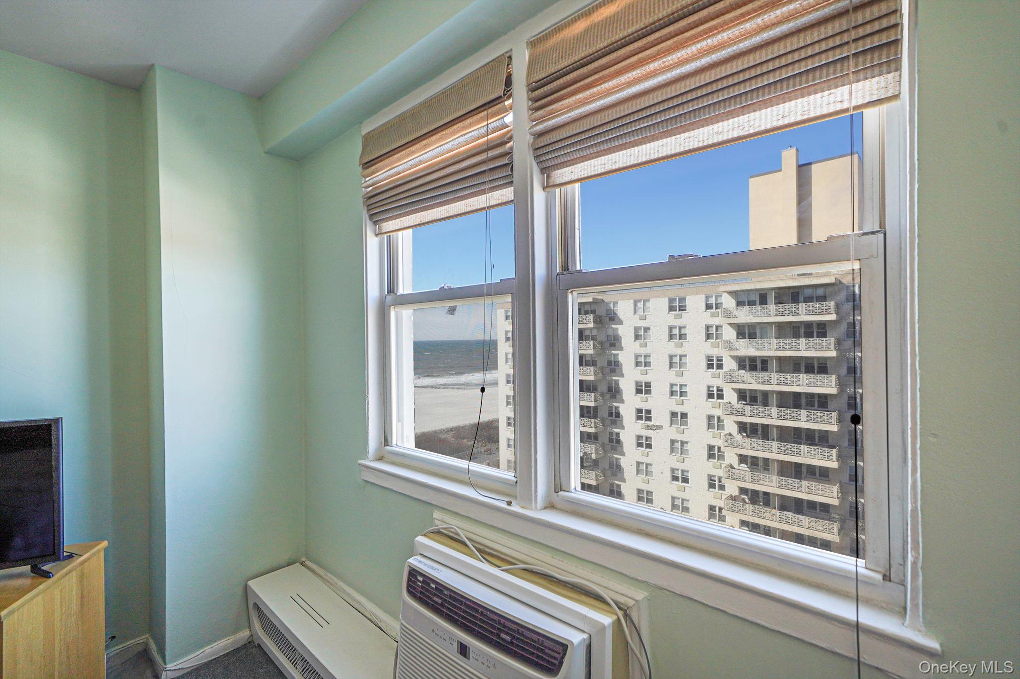 450 Shore Road, Unit 8G Long Beach, NY 11561 - Photo 13 of 19 a view of a balcony and a window
