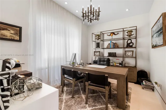a large bathroom with a glass door shower and sink