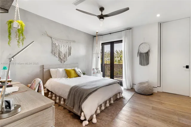 a bedroom with furniture and a window