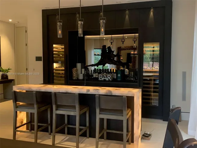 a view of swimming pool outdoor seating and yard