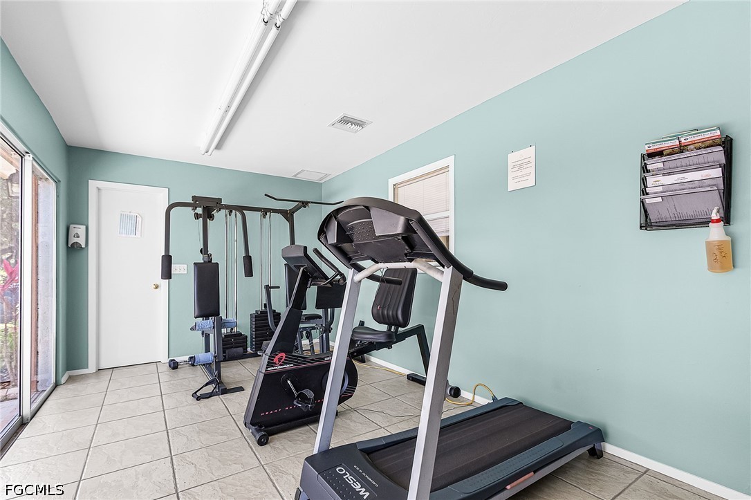 5 Erica Street Alva, FL 33920 - Photo 31 of 37 a view of a room with gym equipment
