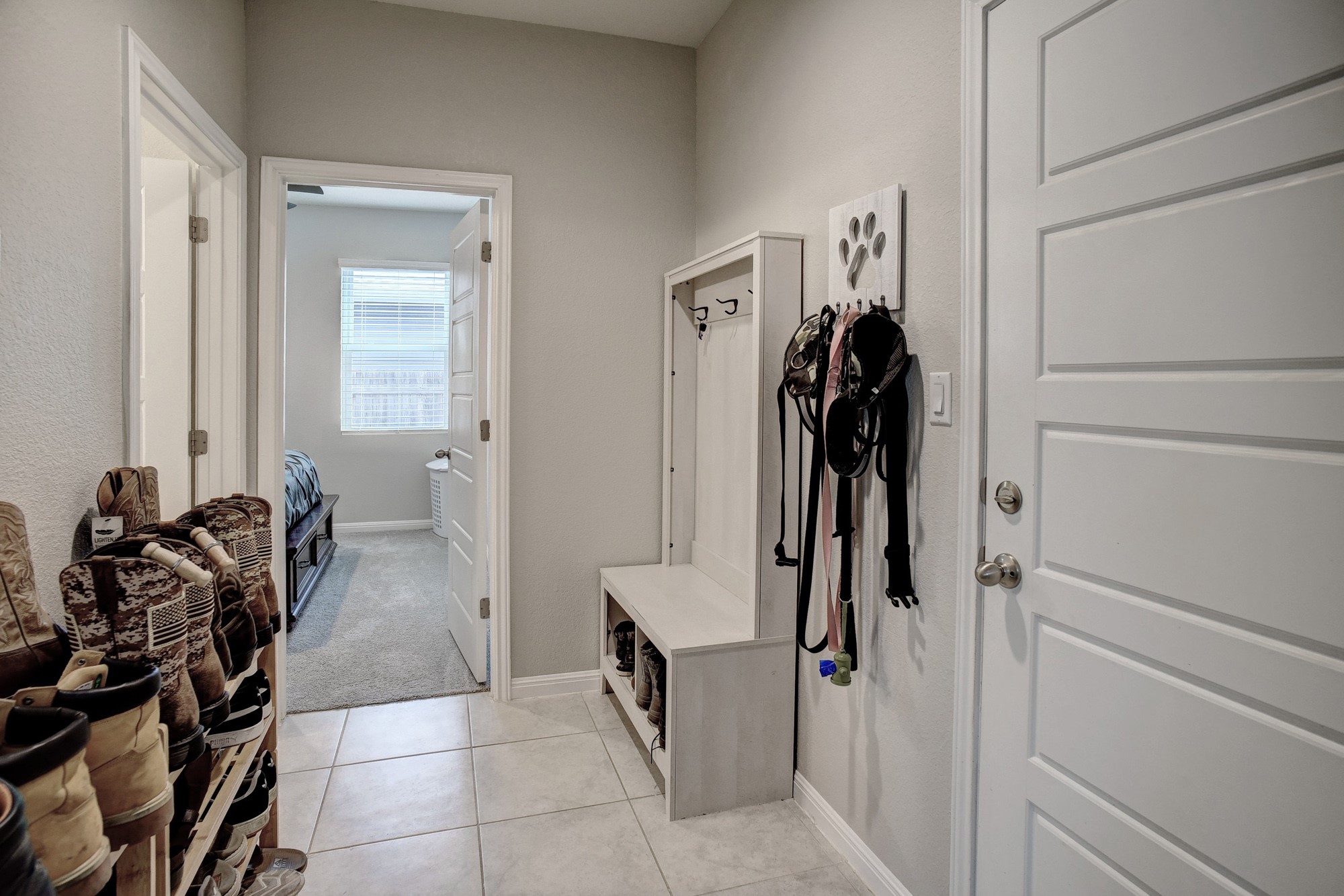 210 Cold Spg Loop Bastrop, TX 78602 - Photo 19 of 40 Mudroom with baseboards and light tile patterned flooring
