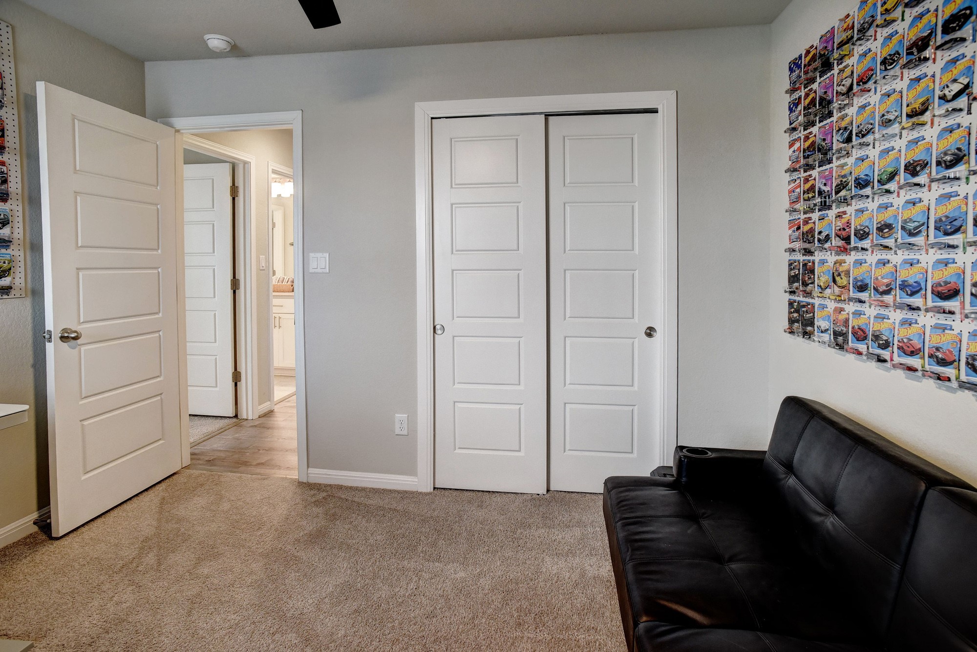210 Cold Spg Loop Bastrop, TX 78602 - Photo 33 of 40 Living area with light colored carpet and baseboards