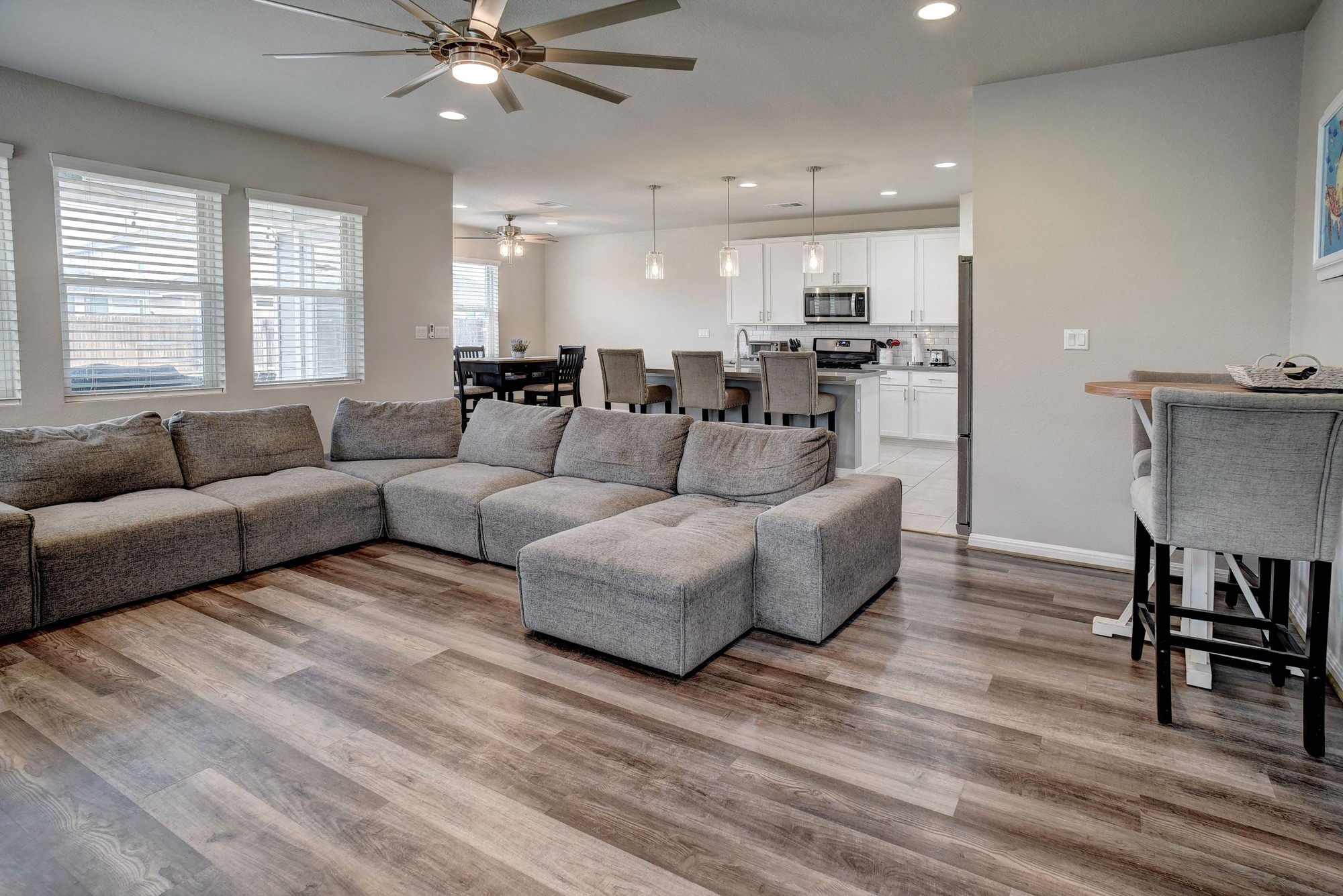 210 Cold Spg Loop Bastrop, TX 78602 - Photo 6 of 40 Living room featuring recessed lighting, light wood-style floors, and a ceiling fan