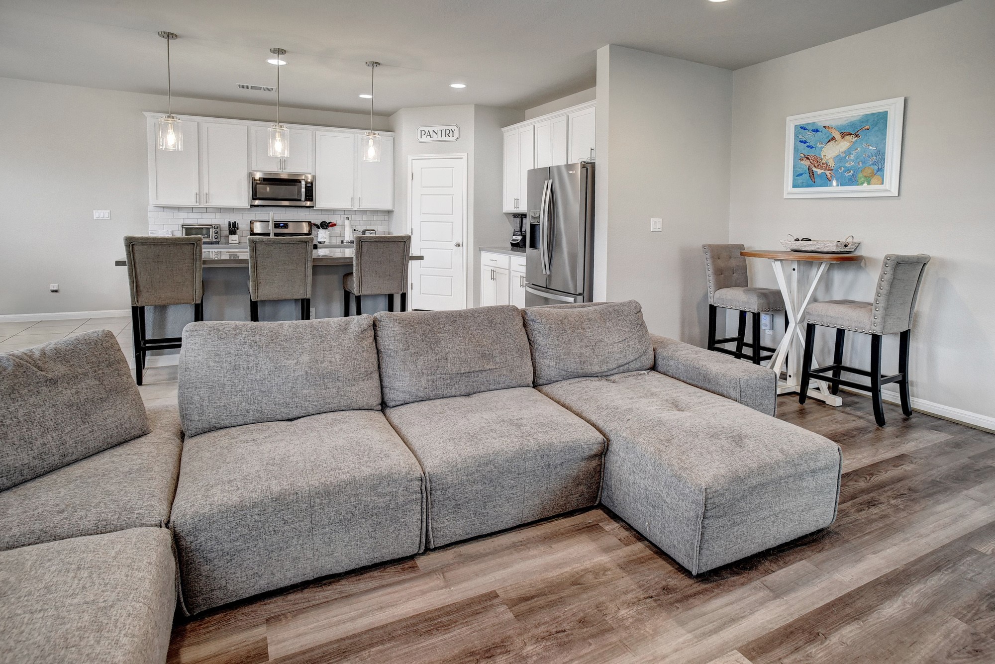 210 Cold Spg Loop Bastrop, TX 78602 - Photo 10 of 40 Living room with light wood-style flooring and recessed lighting