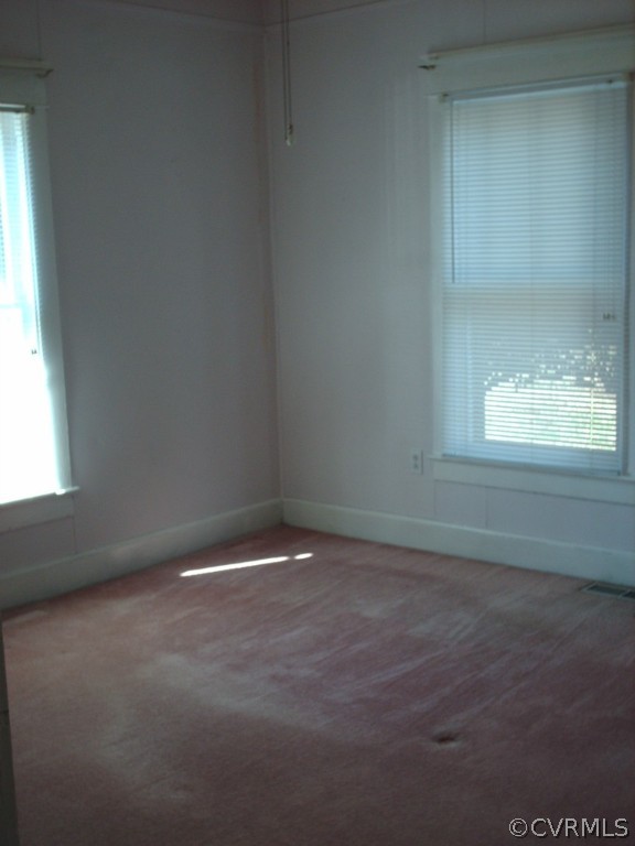 1521 Point Of Rocks Road Chester, VA 23836 - Photo 12 of 12 a view of an empty room with a window