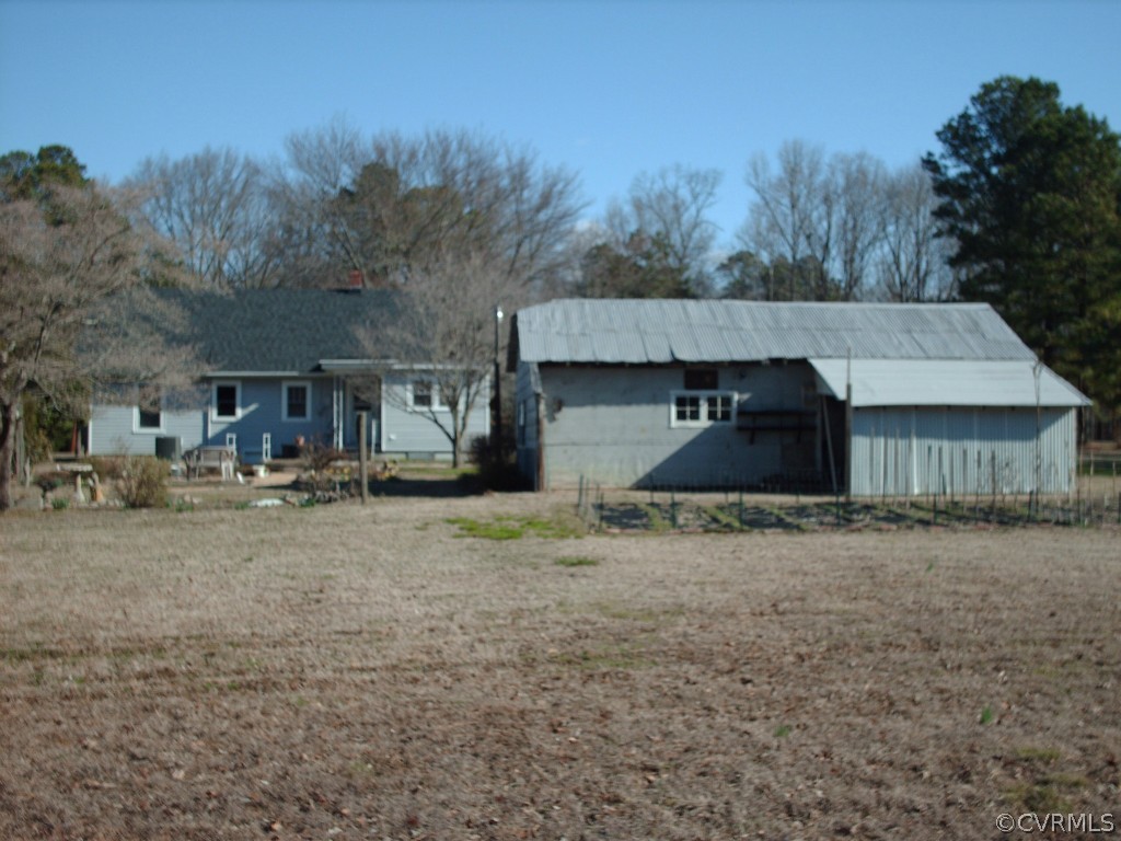 1521 Point Of Rocks Road Chester, VA 23836 - Photo 3 of 12 a view of a house with a yard