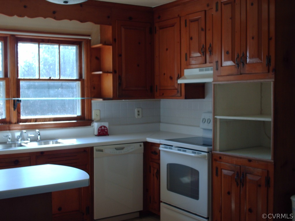 1521 Point Of Rocks Road Chester, VA 23836 - Photo 7 of 12 a kitchen with a sink cabinets and appliances