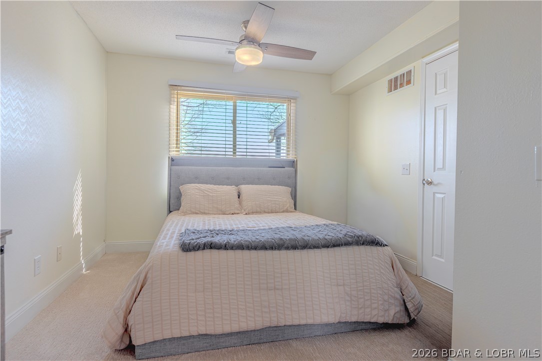 1436 Cherokee Road, Unit 2B Lake Ozark, MO 65049 - Photo 12 of 30 Downstairs Bedroom
