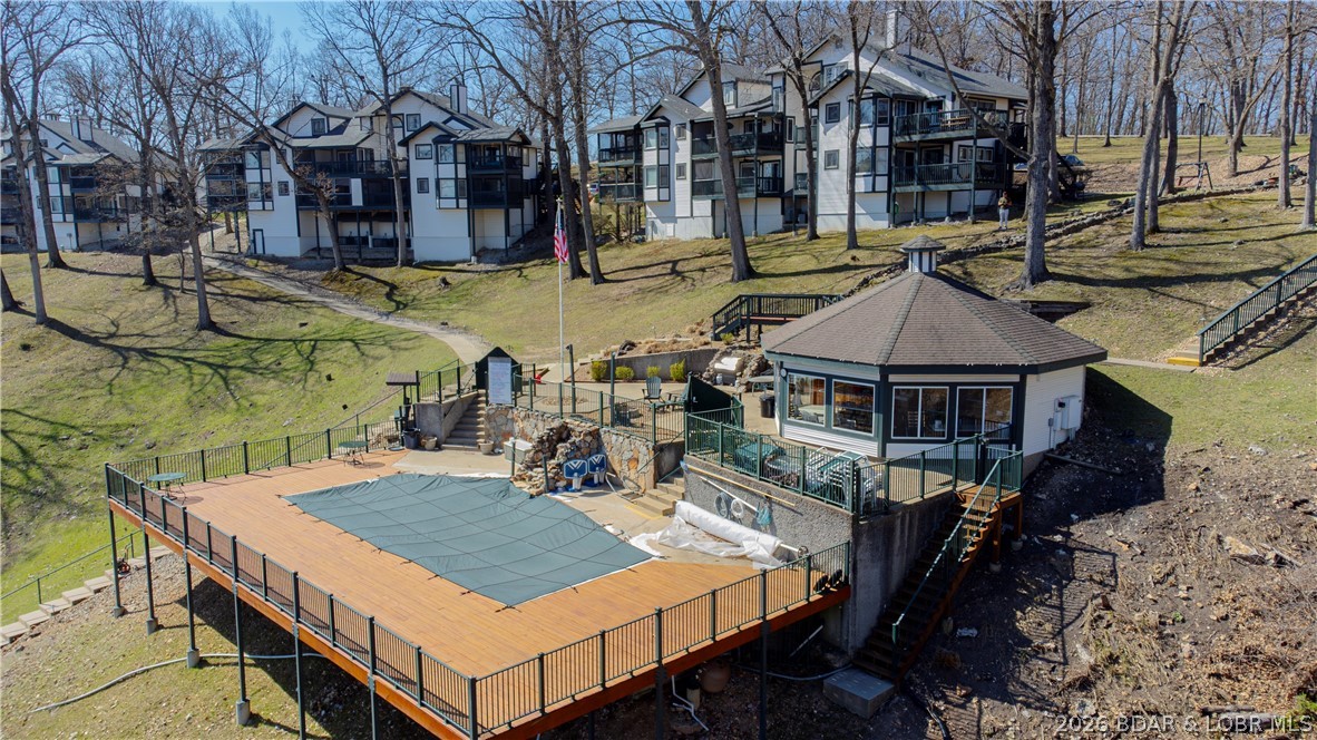 1436 Cherokee Road, Unit 2B Lake Ozark, MO 65049 - Photo 26 of 30 Clubhouse with Pool