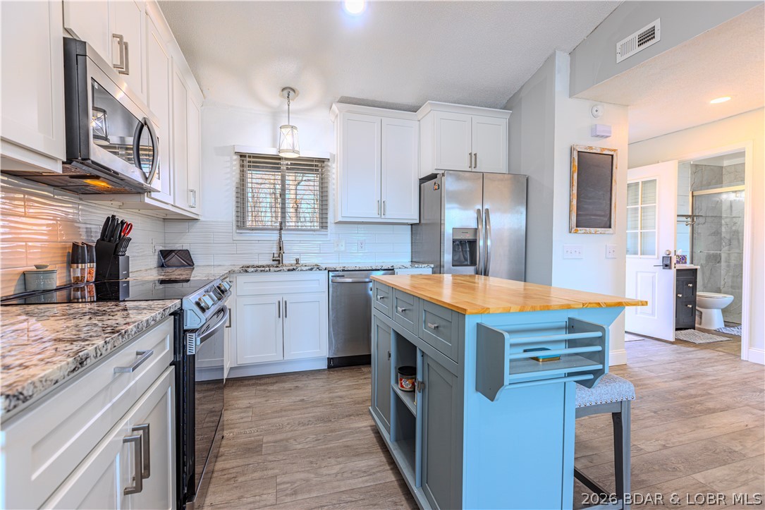 1436 Cherokee Road, Unit 2B Lake Ozark, MO 65049 - Photo 9 of 30