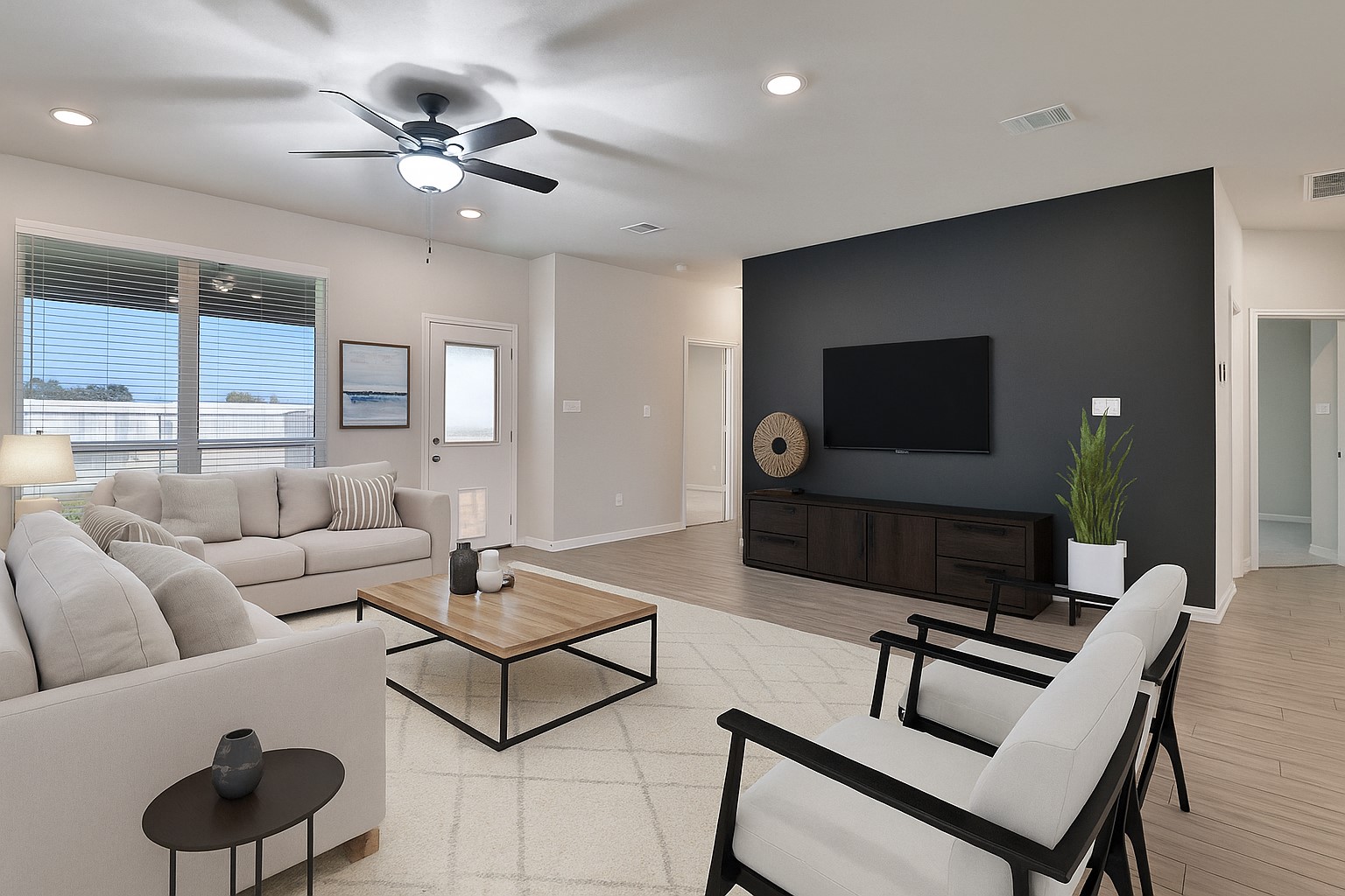 1926 Viva Road Bryan, TX 77807 - Photo 15 of 39 a living room with furniture and a flat screen tv