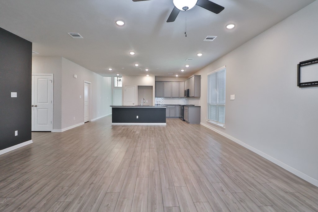 1926 Viva Road Bryan, TX 77807 - Photo 16 of 39 a view of kitchen and kitchen with a wooden floor