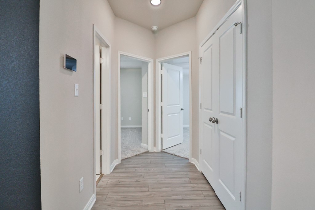 1926 Viva Road Bryan, TX 77807 - Photo 32 of 39 a view of hallway with wooden floor