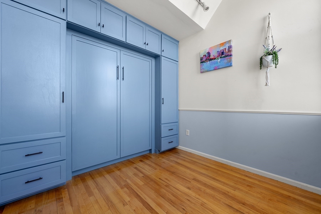 486 East 3rd Street, Unit 6 Boston, MA 02127 - Photo 14 of 20 a view of a room with wooden floor