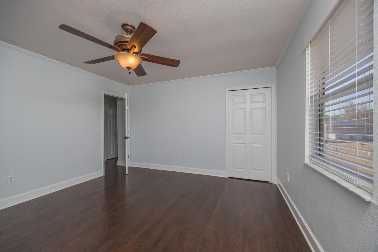 4420 Carter Road, Unit 27 St. Augustine, FL 32086 - Photo 20 of 30 wooden floor in an empty room with a window