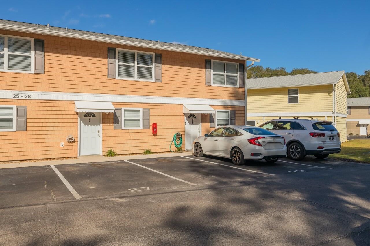 4420 Carter Road, Unit 27 St. Augustine, FL 32086 - Photo 28 of 30 a view of a cars park in front of a house