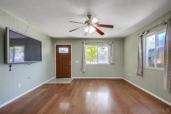 a view of a livingroom with a flat screen tv