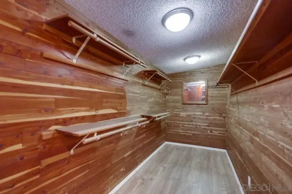 a tree is standing in front of a house