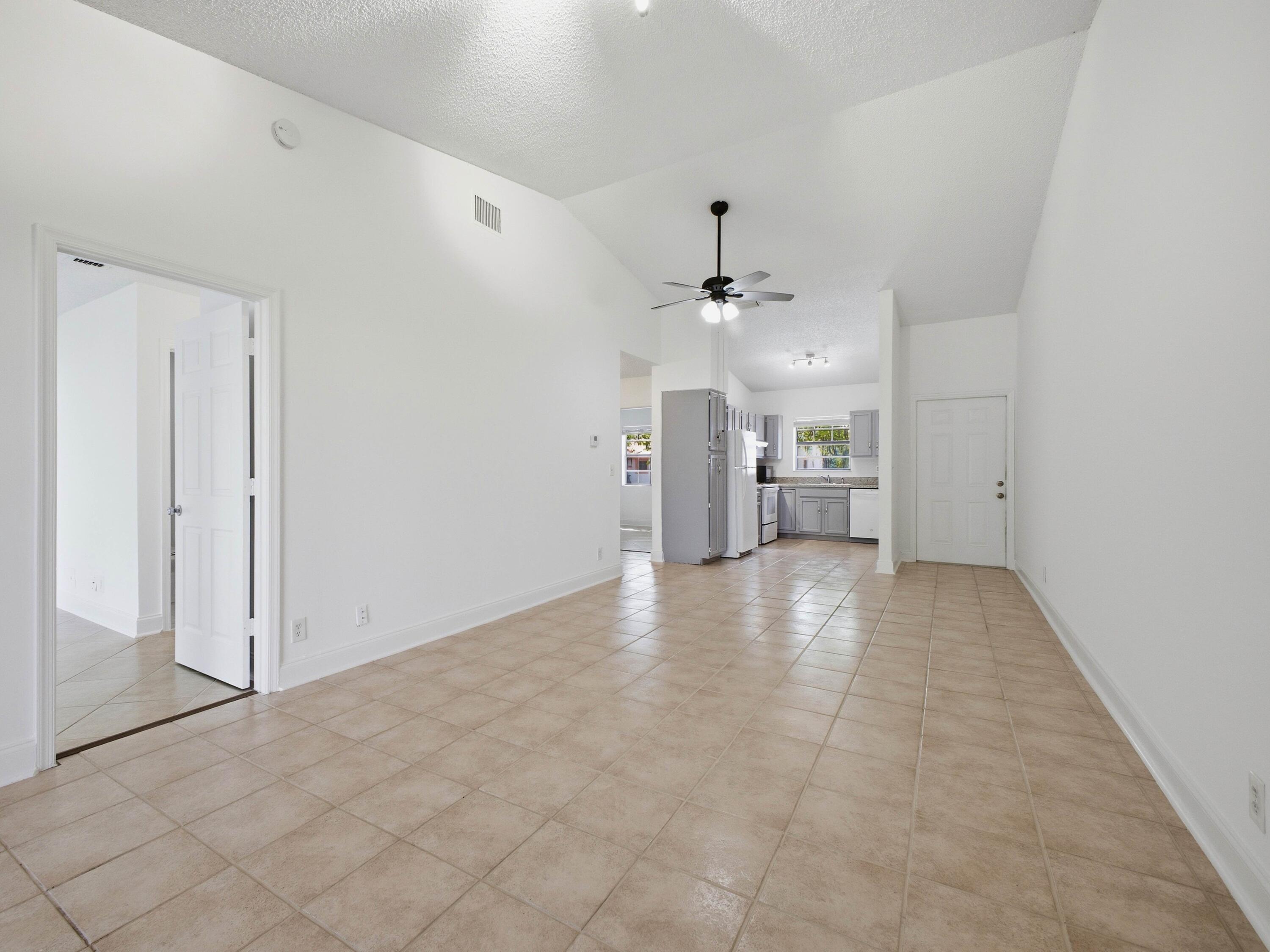 321 Norwood Terrace, Unit N221 Boca Raton, FL 33431 - Photo 8 of 36 Living to Kitchen