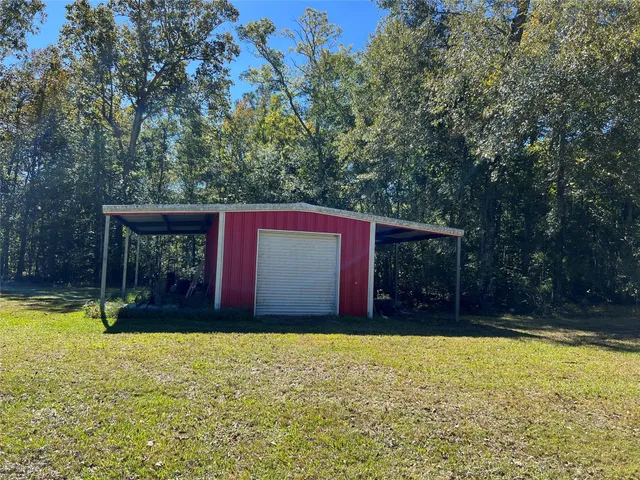 a view of swimming pool with a backyard