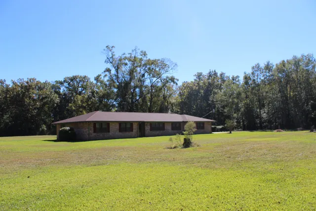 a view of a swimming pool with an outdoor space