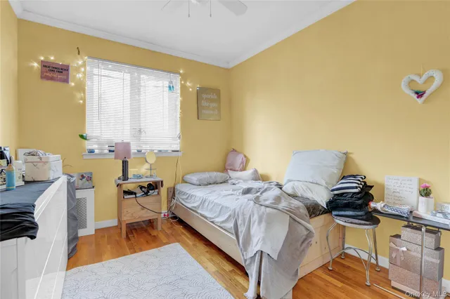 a bedroom with a bed and a table in it