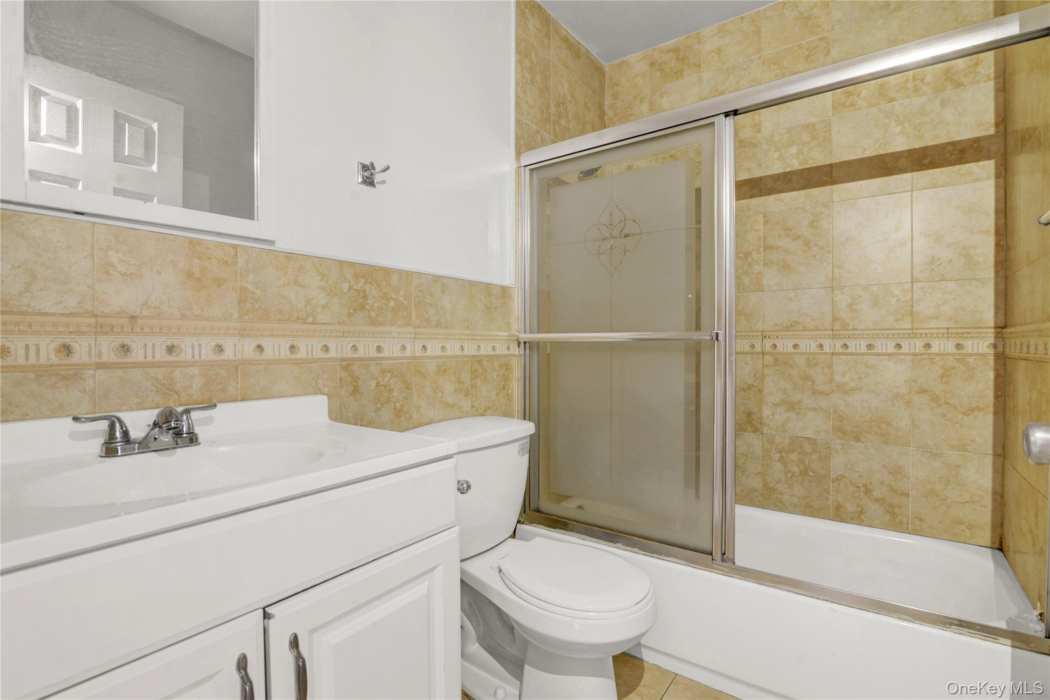 20-39 49th Street Queens, NY 11105 - Photo 17 of 26 a bathroom with a sink toilet and shower