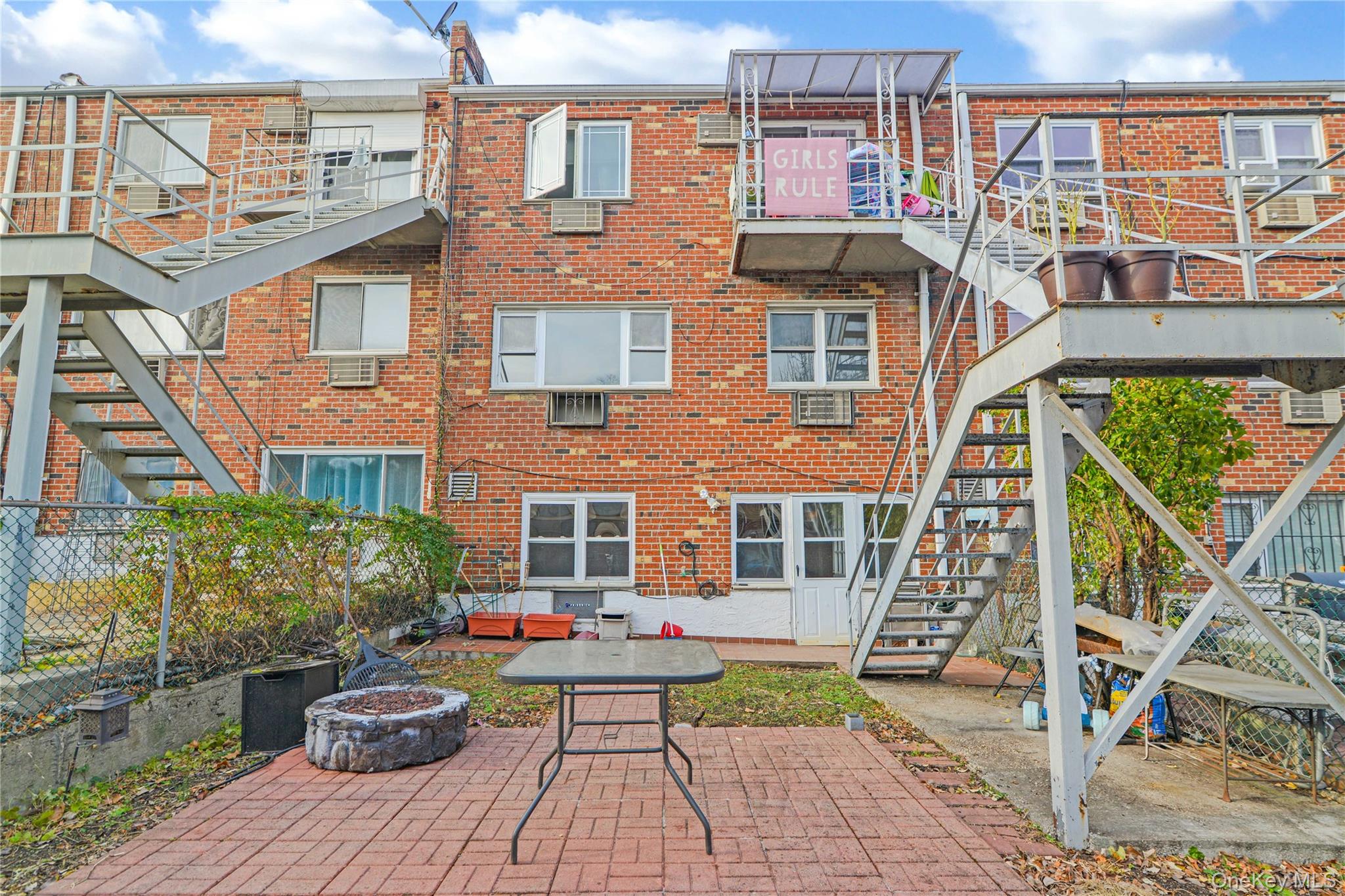 20-39 49th Street Queens, NY 11105 - Photo 2 of 26 a view of a brick building with many windows
