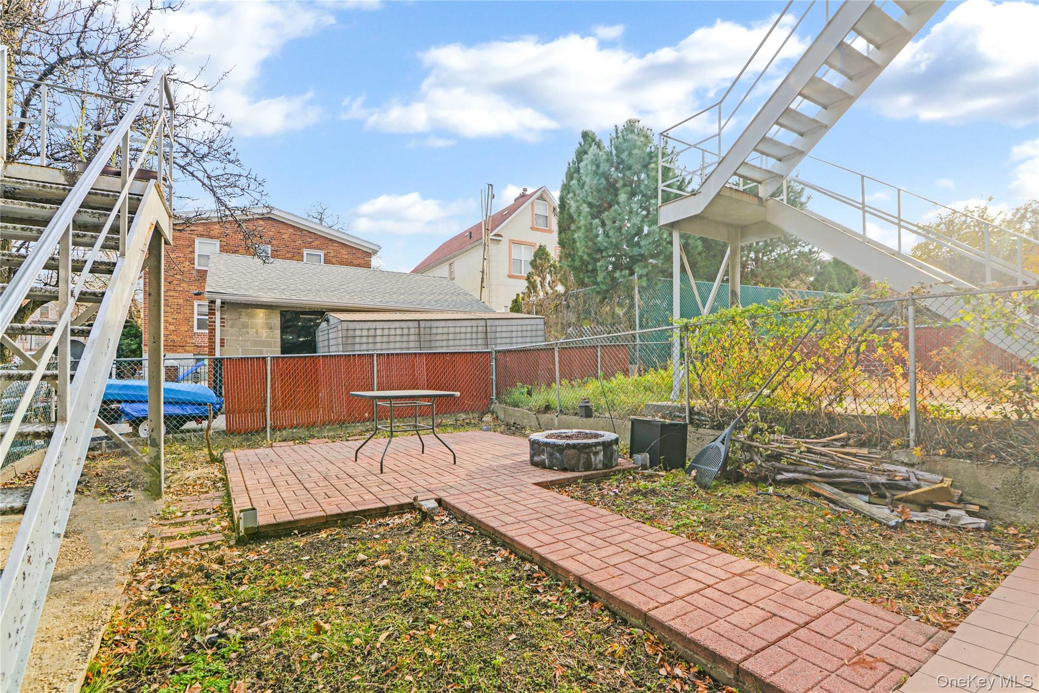 20-39 49th Street Queens, NY 11105 - Photo 3 of 26 a view of a backyard with sitting area