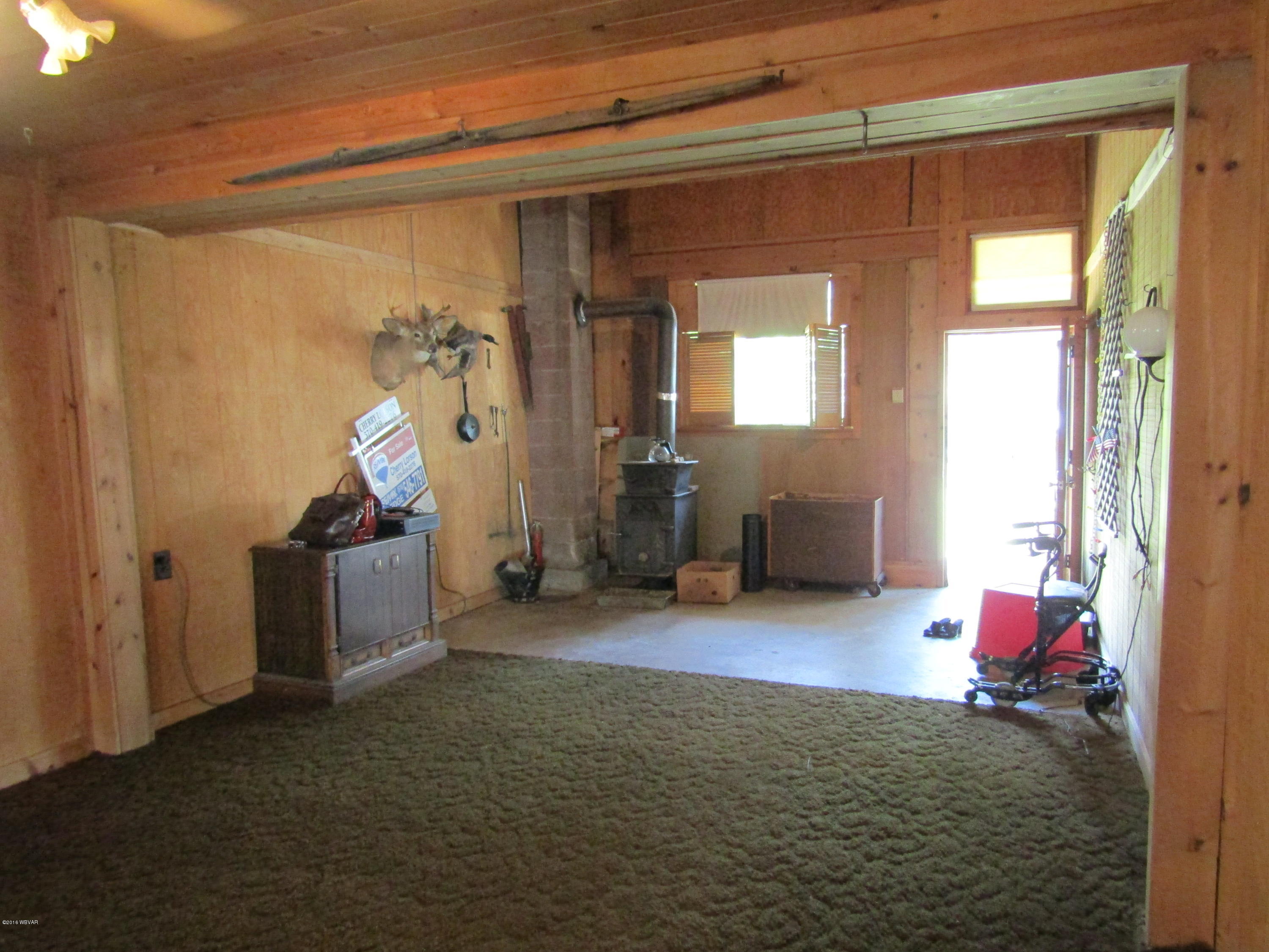 1648 Long Run Road Mill Hall, PA 17751 - Photo 9 of 48 Family room with woodstove