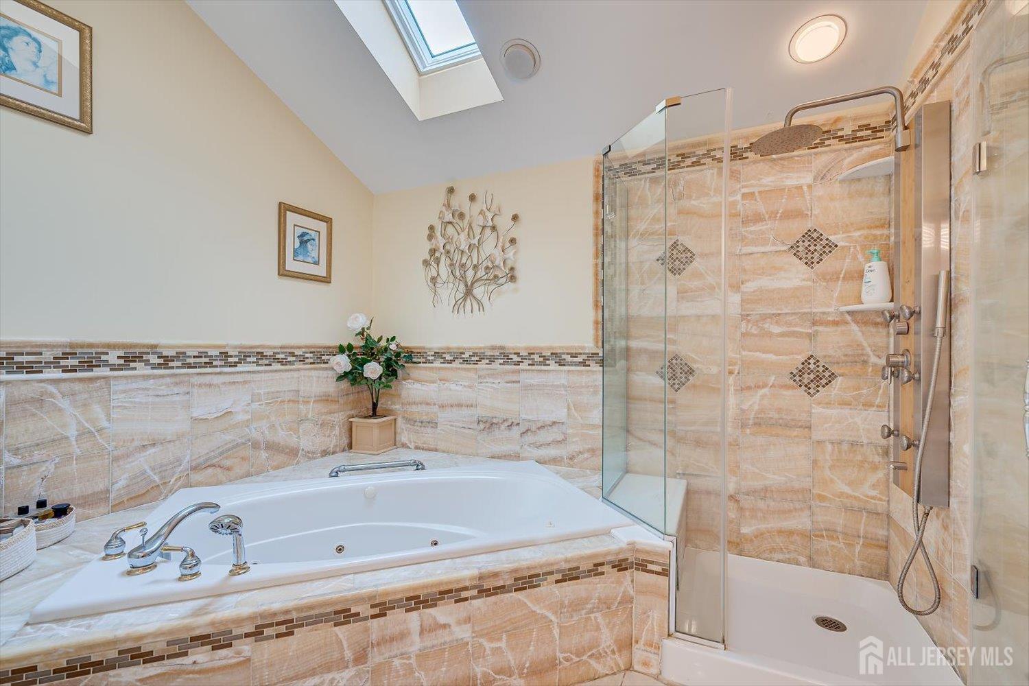 114 Coppertree Court Edison, NJ 08820 - Photo 31 of 47 a bathroom with a tub and a shower