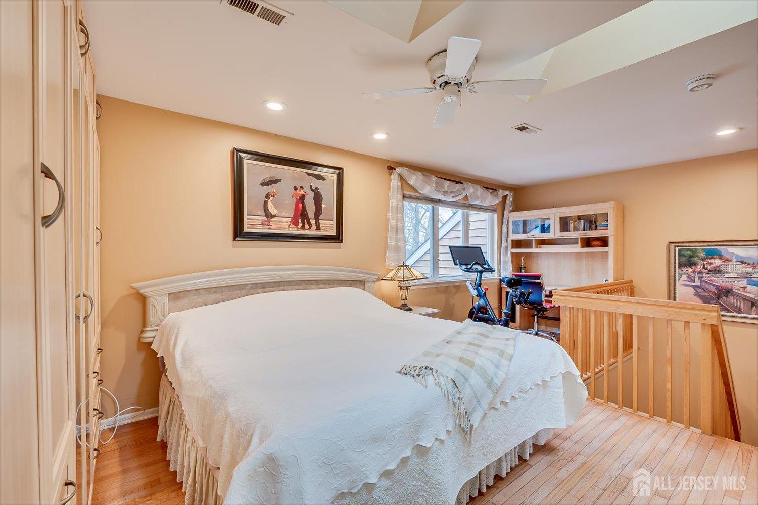 114 Coppertree Court Edison, NJ 08820 - Photo 36 of 47 a bed sitting in a bedroom next to a window