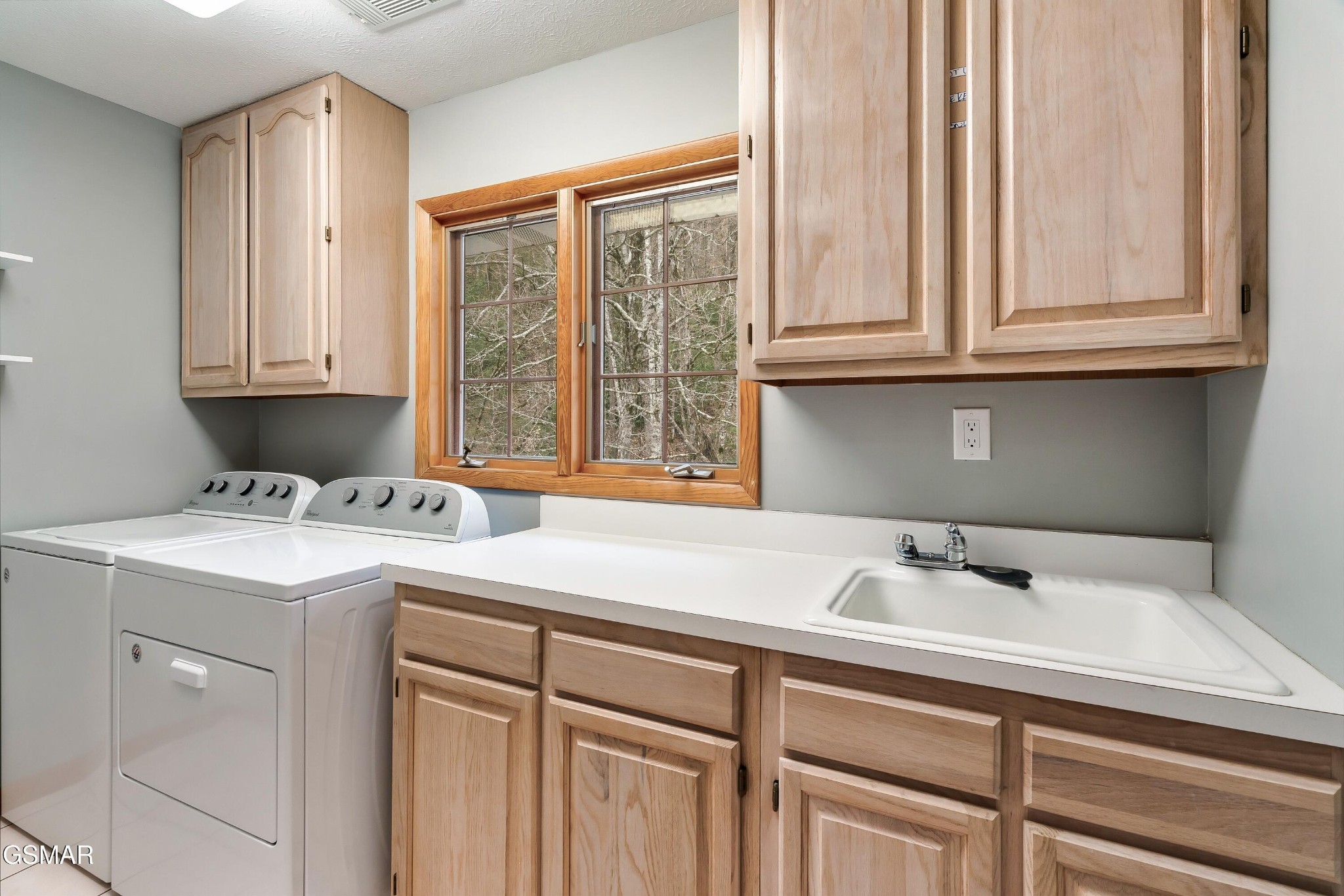 4062 Wilhite Road Sevierville, TN 37876 - Photo 27 of 50 a bathroom with a sink and a window