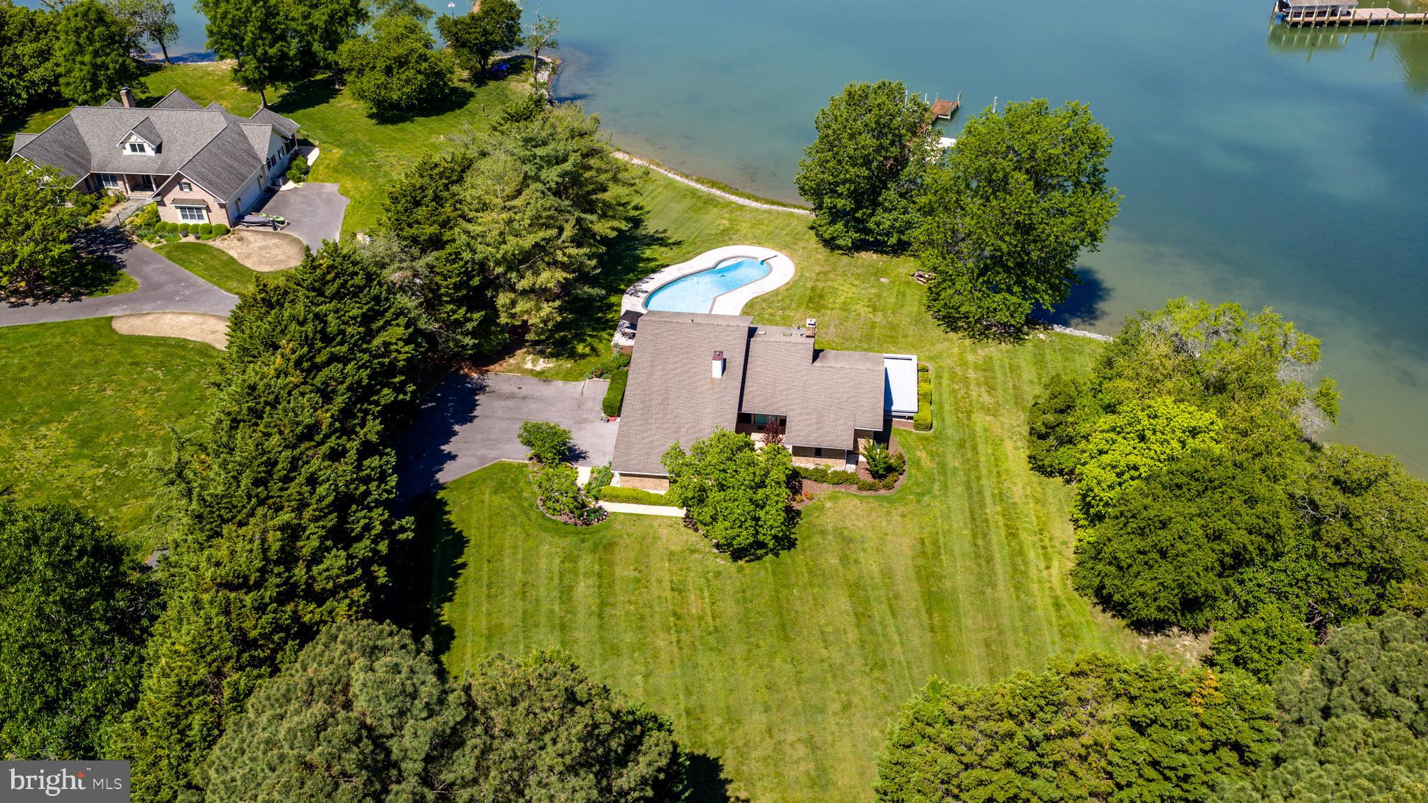 26282 Deep Water Harbor Road Easton, MD 21601 - Photo 3 of 53 an aerial view of a residential houses