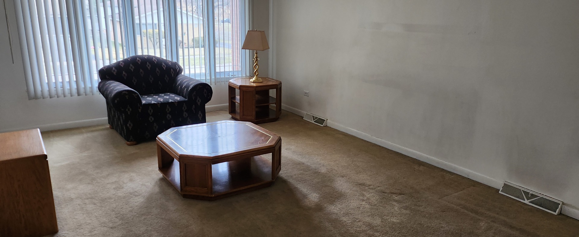 Undisclosed Address Midlothian, IL 60445 - Photo 2 of 23 a living room with furniture and a large window