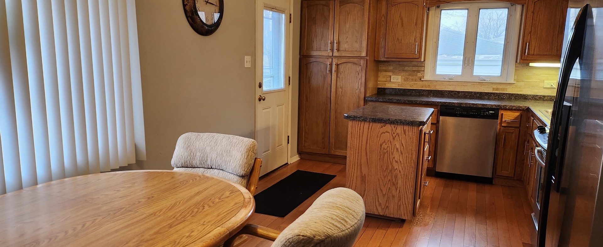 Undisclosed Address Midlothian, IL 60445 - Photo 7 of 23 a bedroom with a bed and a chair