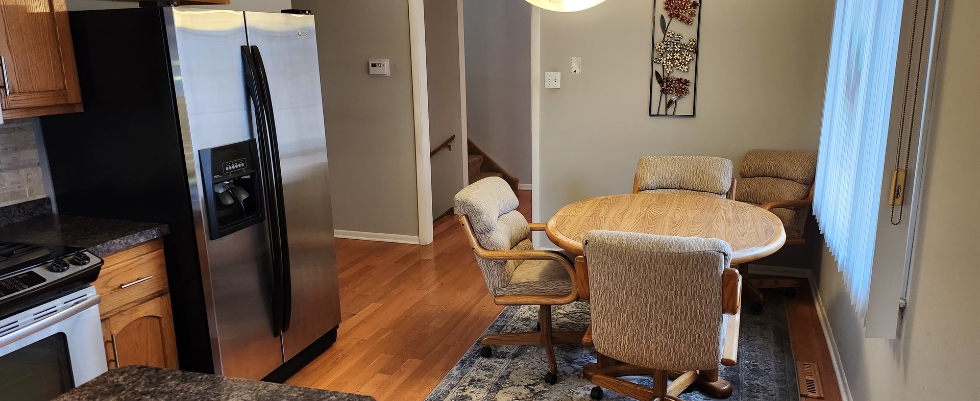 Undisclosed Address Midlothian, IL 60445 - Photo 8 of 23 a dining room with furniture and wooden floor