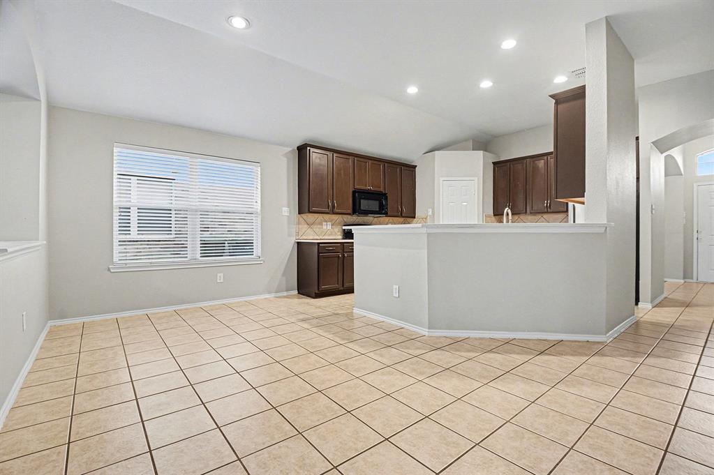 1021 Comfort Drive Forney, TX 75126 - Photo 16 of 37 a view of a livingroom with a kitchen