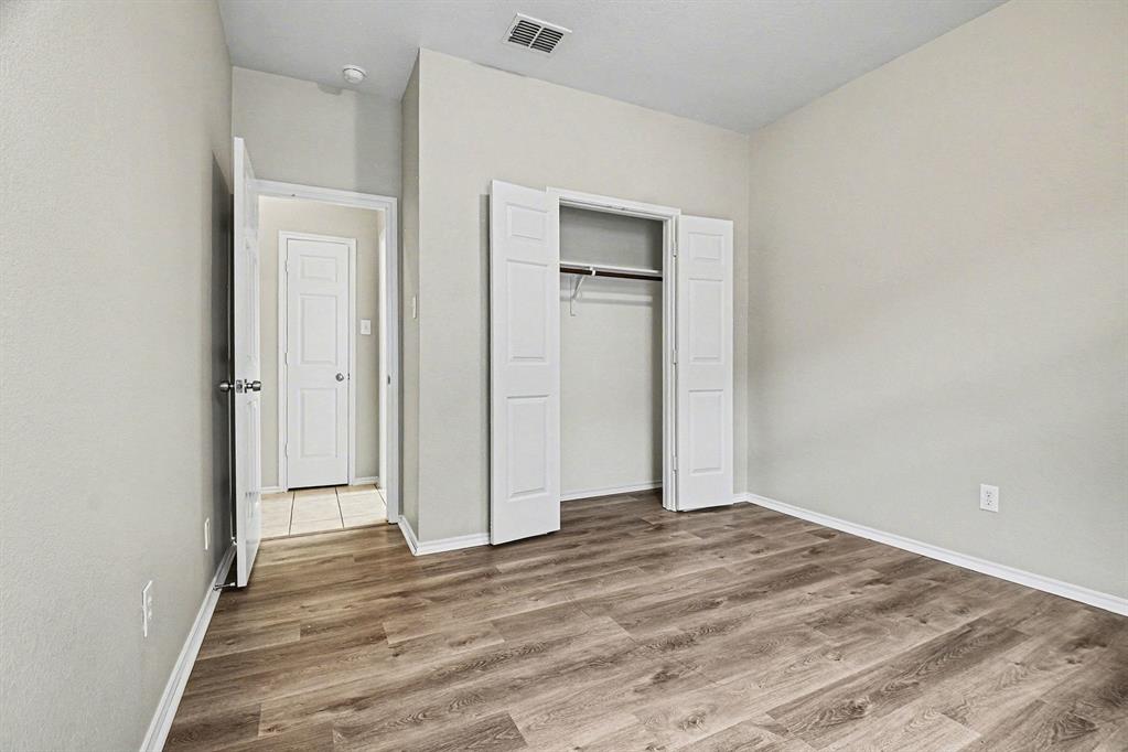 1021 Comfort Drive Forney, TX 75126 - Photo 25 of 37 a view of a room with wooden floor and closet
