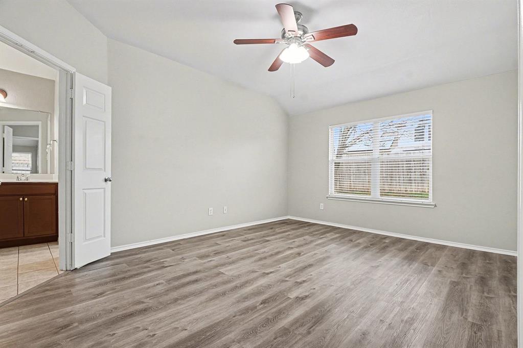 1021 Comfort Drive Forney, TX 75126 - Photo 28 of 37 a view of empty room with wooden floor and fan