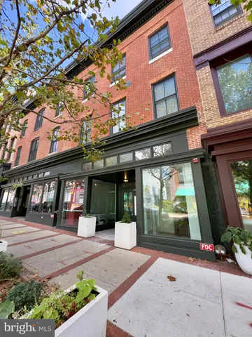 a view of a building with a porch