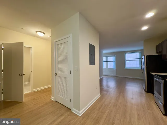 a view of a livingroom with wooden floor